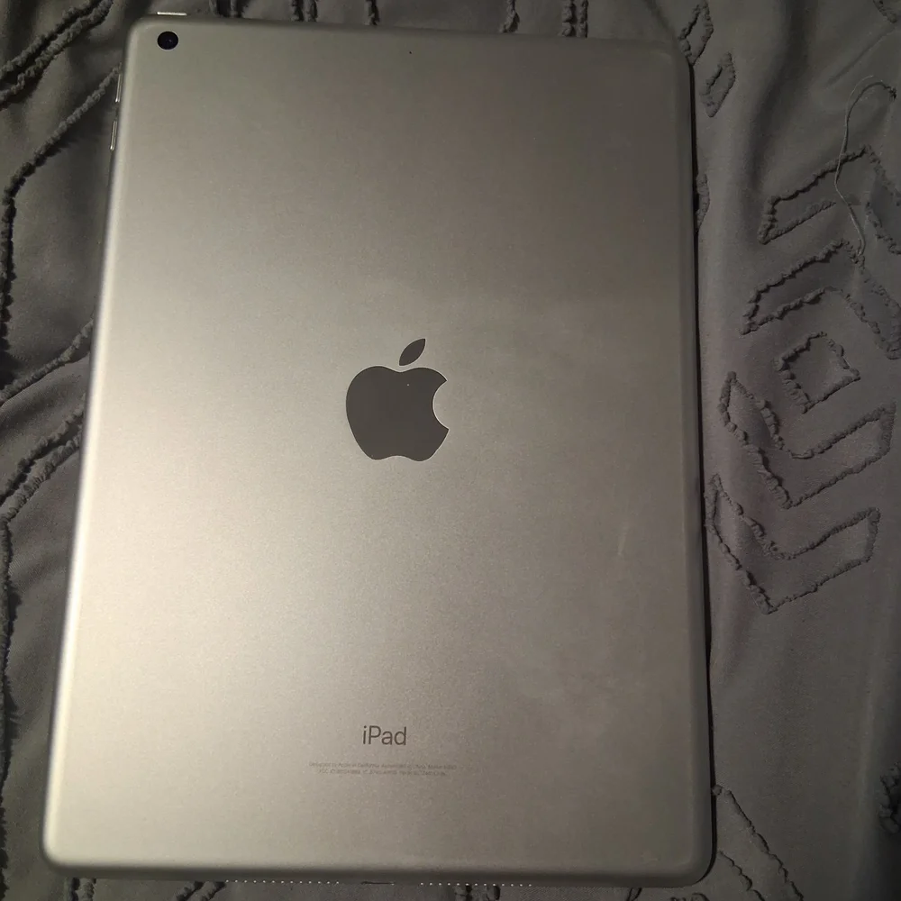 Locked White iPad 6th Generation Tablet